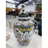 A LARGE ORIENTAL LIDDED JAR WITH LION FIGURED FINIAL DECORATED WITH BIRDS AND FLOWERS,