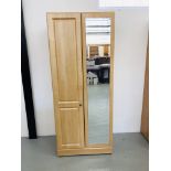 A MODERN TWO DOOR LIMED FINISH WARDROBE WITH MIRROR TO ONE DOOR WIDTH 80CM. HEIGHT 192CM.