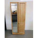 A MODERN TWO DOOR LIMED FINISH WARDROBE WITH MIRROR TO ONE DOOR WIDTH 80CM. HEIGHT 192CM.