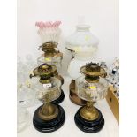 TWO COPPER BASED OIL LAMPS ONE MARKED FAMOS,