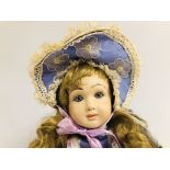 VINTAGE BISQUE HEAD DOLL DRESSED IN HAND