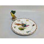 A PLATE DECORATED WITH AN EXOTIC BIRD BE