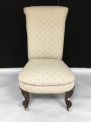 A VICTORIAN NURSING CHAIR WITH WALNUT SC