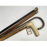 FOUR SILVER MOUNTED WALKING STICKS