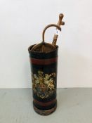 A LEATHER STICK STAND DECORATED WITH THE