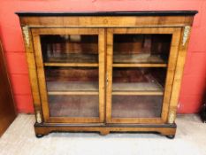 A C19TH WALNUT TWO DOOR CABINET WITH GIL