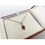 A 9CT GOLD CHAIN WITH THREE STONE RUBY P