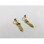 A PAIR OF MIDDLE EASTERN YELLOW METAL DR