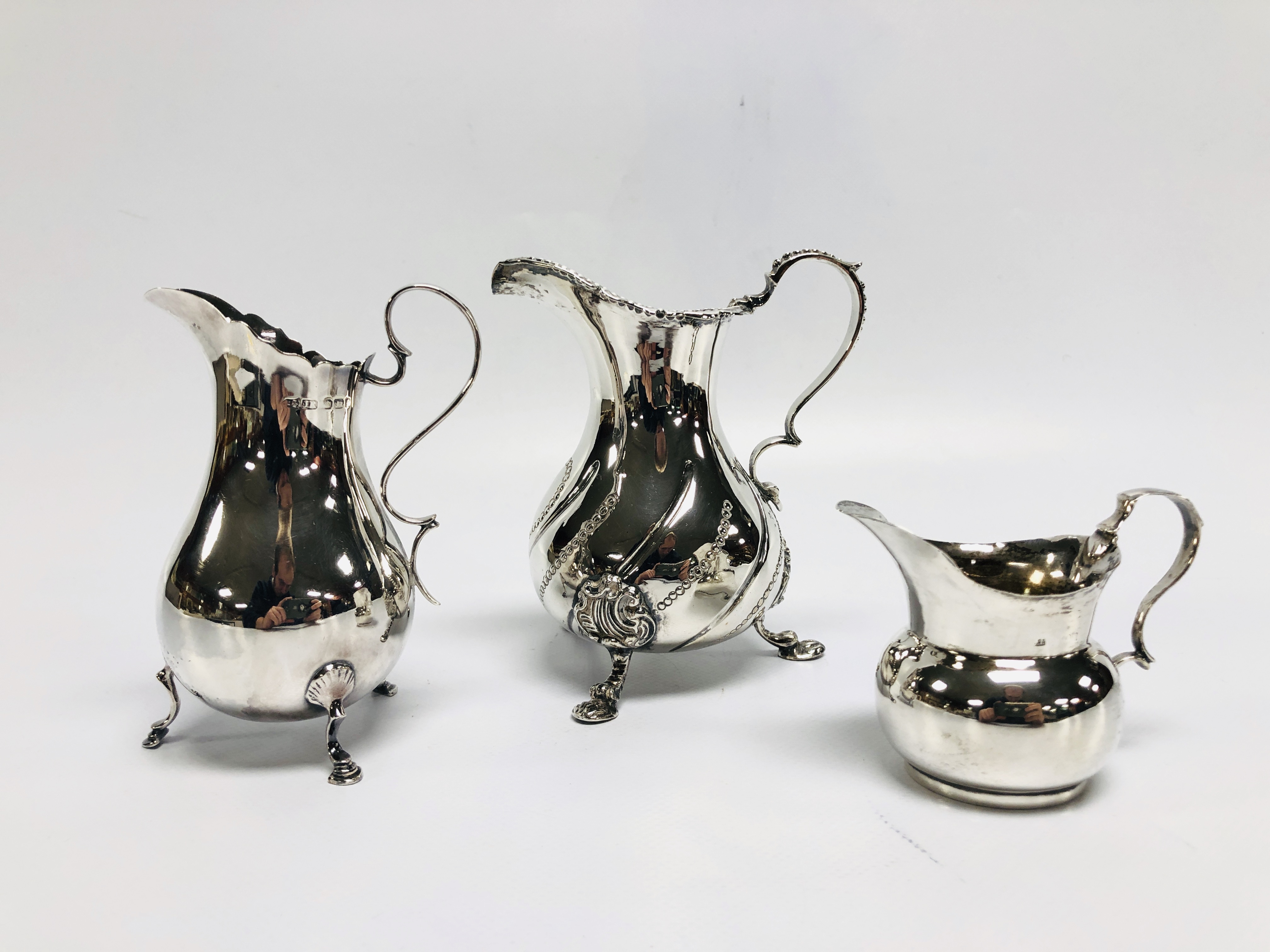 THREE SILVER CREAM JUGS, ALL WITH DOUBLE