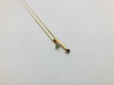 A 14K GOLD FINE CHAIN WITH A TWO STONE P