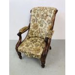 A VICTORIAN ARMCHAIR WITH EXPOSED WALNUT
