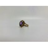 A C19TH AMETHYST RING, THE SINGLE STONE