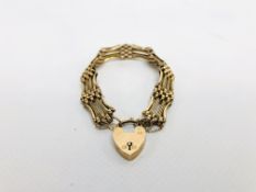 A 9CT GOLD GATE BRACELET WITH LOCK CLASP