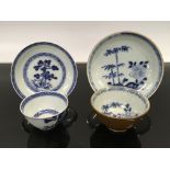 TWO NANKING CARGO TEA BOWLS WITH SAUCERS