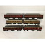 SIX HORNBY CARRIAGES TO INCLUDE FOUR RED