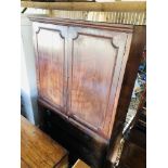 A GEORGIAN MAHOGANY THREE DRAWER CHEST WITH TWO DOOR CUPBOARD ABOVE VERY POOR CONDITION