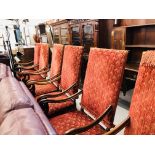 A SET OF SIX HARDWOOD FRAMED HIGH BACK UPHOLSTERED ELBOW CHAIRS (IN NEED OF RE-UPHOLSTERY)