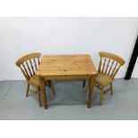 A QUALITY HONEY PINE DINING TABLE (91CM X 70CM) COMPLETE WITH 2 BEECH WOOD DINING CHAIRS