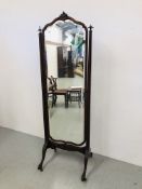 A MAHOGANY CHEVAL MIRROR WITH SHAPED AND BEVELLED GLASS