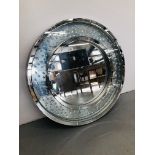 A DESIGNER CRYSTAL ROUND MIRROR