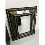 A C19TH DUTCH MIRROR IN C17TH STYLE - THE EBONISED FRAME APPLIED WITH DECORATIVE BRASS WORK 84 X