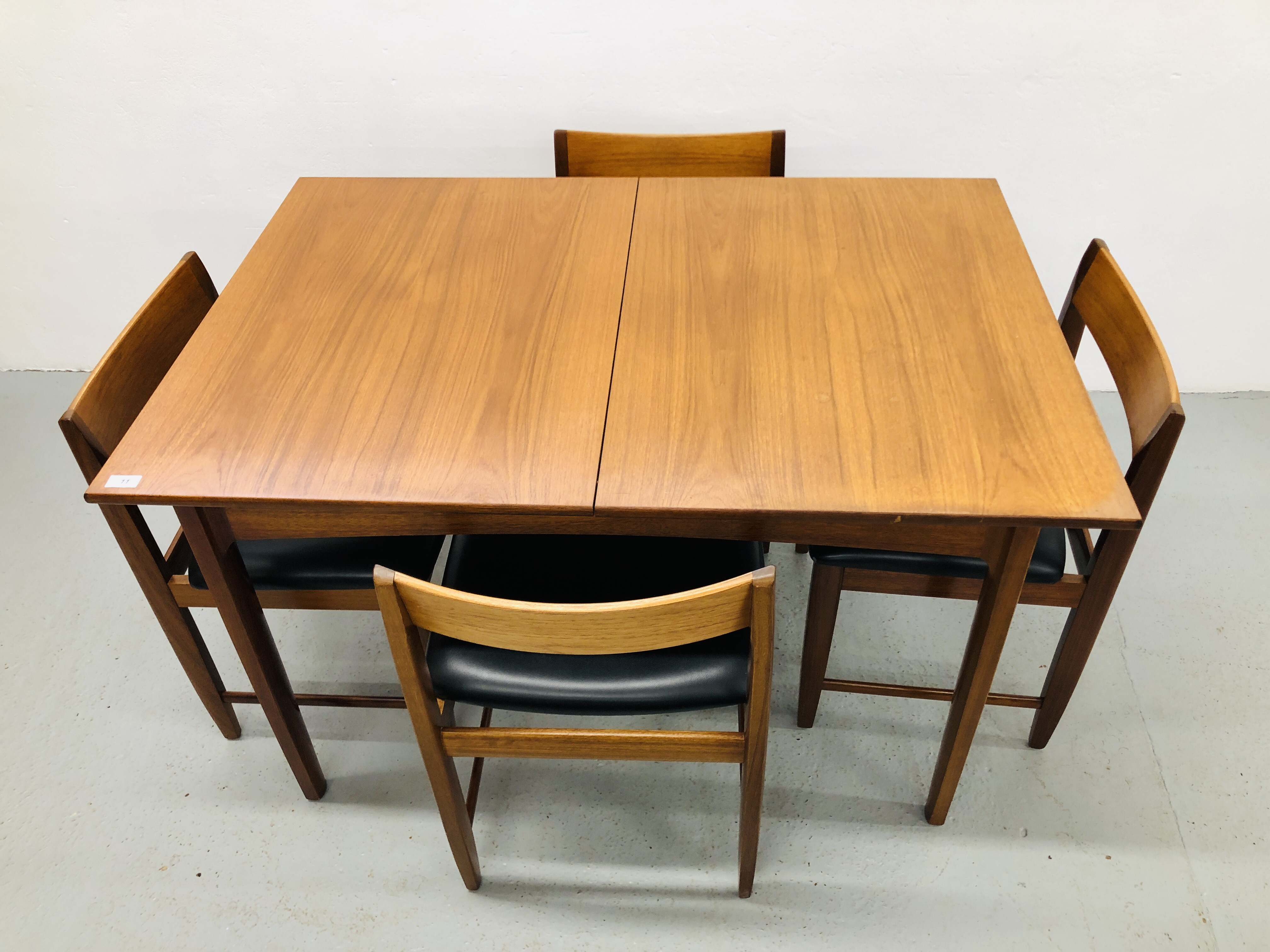 RETRO TEAK STYLE EXTENDING DINING TABLE TOGETHER WITH A SET OF 4 MATCHING CHAIRS WITH BLACK FAUX - Image 2 of 5