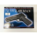 A STI LAWNMAN 6MM CALIBRE BB GAS TYPE SEMI AUTOMATIC PISTOL WITH BOX AND INSTRUCTIONS - SOLD AS