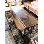 AN ANTIQUE OAK GATELEG DINING TABLE,