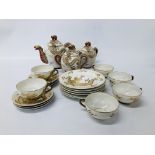 AN ORIENTAL 21 PIECE RELIEF DRAGON DECORATED TEASET