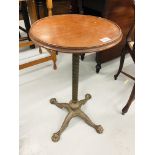 A VICTORIAN READING STAND WITH ALTERNATIVE CIRCULAR TOP ON IRON BASE