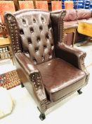 DARK TAN FAUX LEATHER BUTTON BACK CHAIR