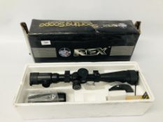 A REX 6-24X50E-SF SPORTING RIFLE SCOPE WITH BOX AND ACCESSORIES - SOLD AS SEEN