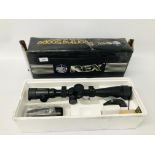 A REX 6-24X50E-SF SPORTING RIFLE SCOPE WITH BOX AND ACCESSORIES - SOLD AS SEEN