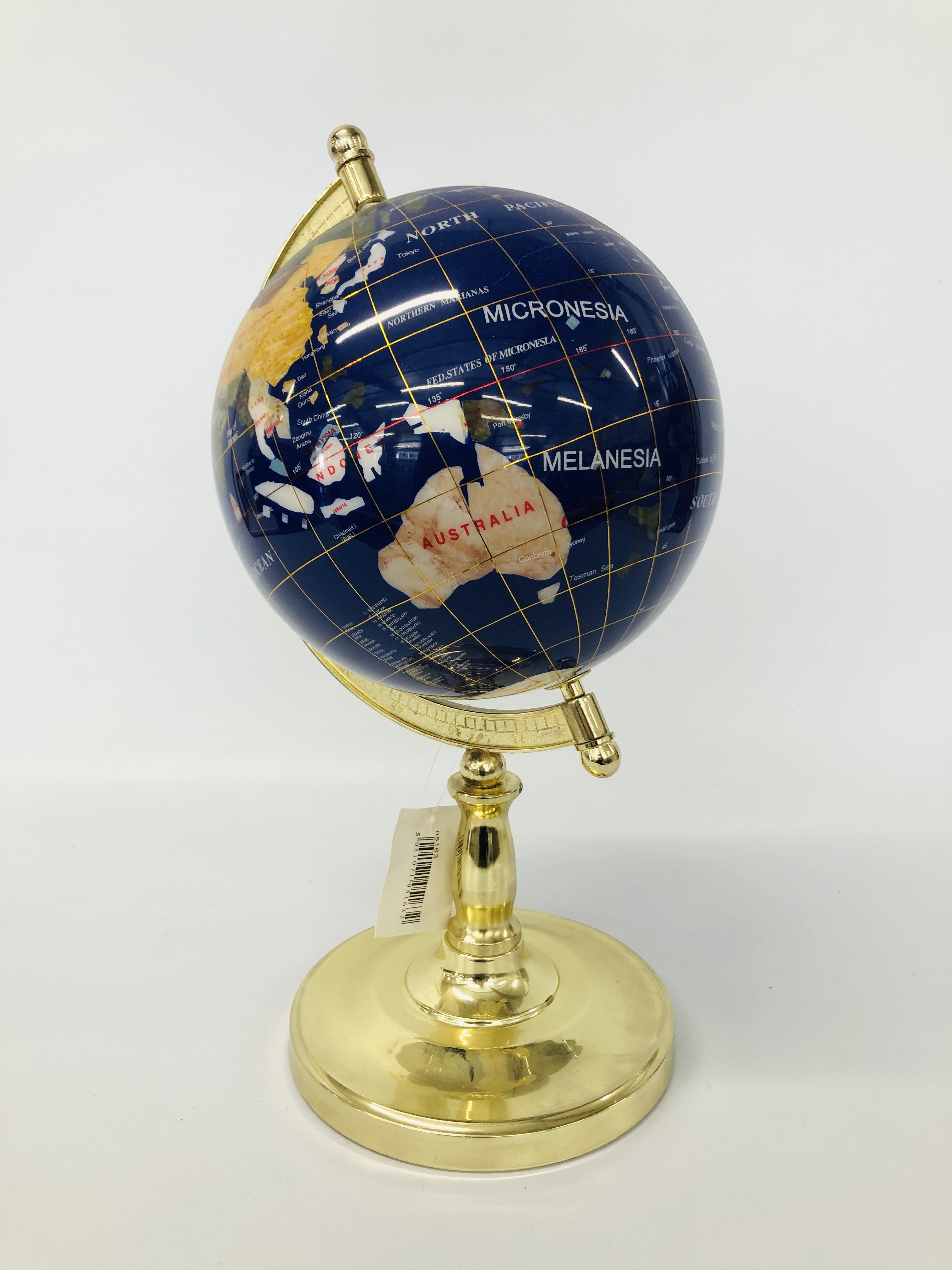 GEM STONE GLOBE ON BRASS STAND