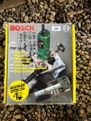 A BOSCH POF 500 A PLUNGE ROUTER WITH ACCESSORIES - SOLD AS SEEN
