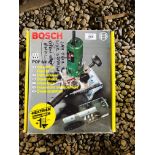 A BOSCH POF 500 A PLUNGE ROUTER WITH ACCESSORIES - SOLD AS SEEN