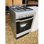 AN INDESIT MAINS GAS DOMESTIC SINGLE OVEN COOKER (BURNER MISSING) - TRADE ONLY - SOLD AS SEEN