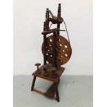 A REPRODUCTION SPINNING WHEEL