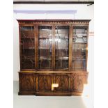 A QUALITY REPRODUCTION MAHOGANY FINISH ASTRAGAL GLAZED BREAK FRONT BOOKCASE WITH CABINET BASE,