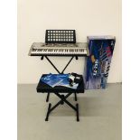 A YAMAHA EZ-250i ELECTRONIC KEYBOARD COMPLETE WITH CHARGER, HANDBOOKS,