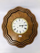 A STRIKING WALL CLOCK,