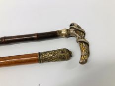 VINTAGE WALKING CANE WHITE METAL & JEWELED DETAIL TO TOP TOGETHER WITH A BAMBOO HORN HANDLED