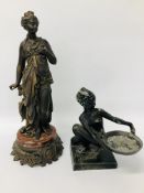 AN ART DECO SPELTER FIGURE OF A CROUCHING WOMAN HOLDING A TRAY BEARING INDISTINCT MARKER MARK TO