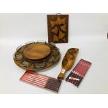 A DANISH TEAK DIGSMED REVOLVING TABLE SERVICE PATE COMPLETE WITH NINE GLASS INSERTS (NO CENTRE