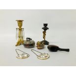 A GILT METAL CANDLESTICK WITH SUSPENDED LUSTRES TOGETHER WITH A CHERUB FIGURED CANDLE STICK,