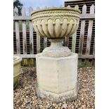 A LARGE STONEWORK GARDEN PLANTER ON OCTAGONAL STONEWORK PEDESTAL BASE