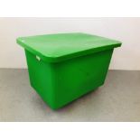 A LARGE COMMERCIAL GREEN PLASTIC WHEELED BIN WITH COVER