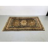 A BLUE/BROWN/BEIGE PATTERNED EASTERN RUG 205cm x 128cm