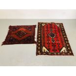 A RED PATTERNED IRANIAN RUG 1.4m x .