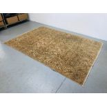 A LARGE BEIGE PATTERNED 100% WOOL PILE RUG, ZIEGLER DESIGN,